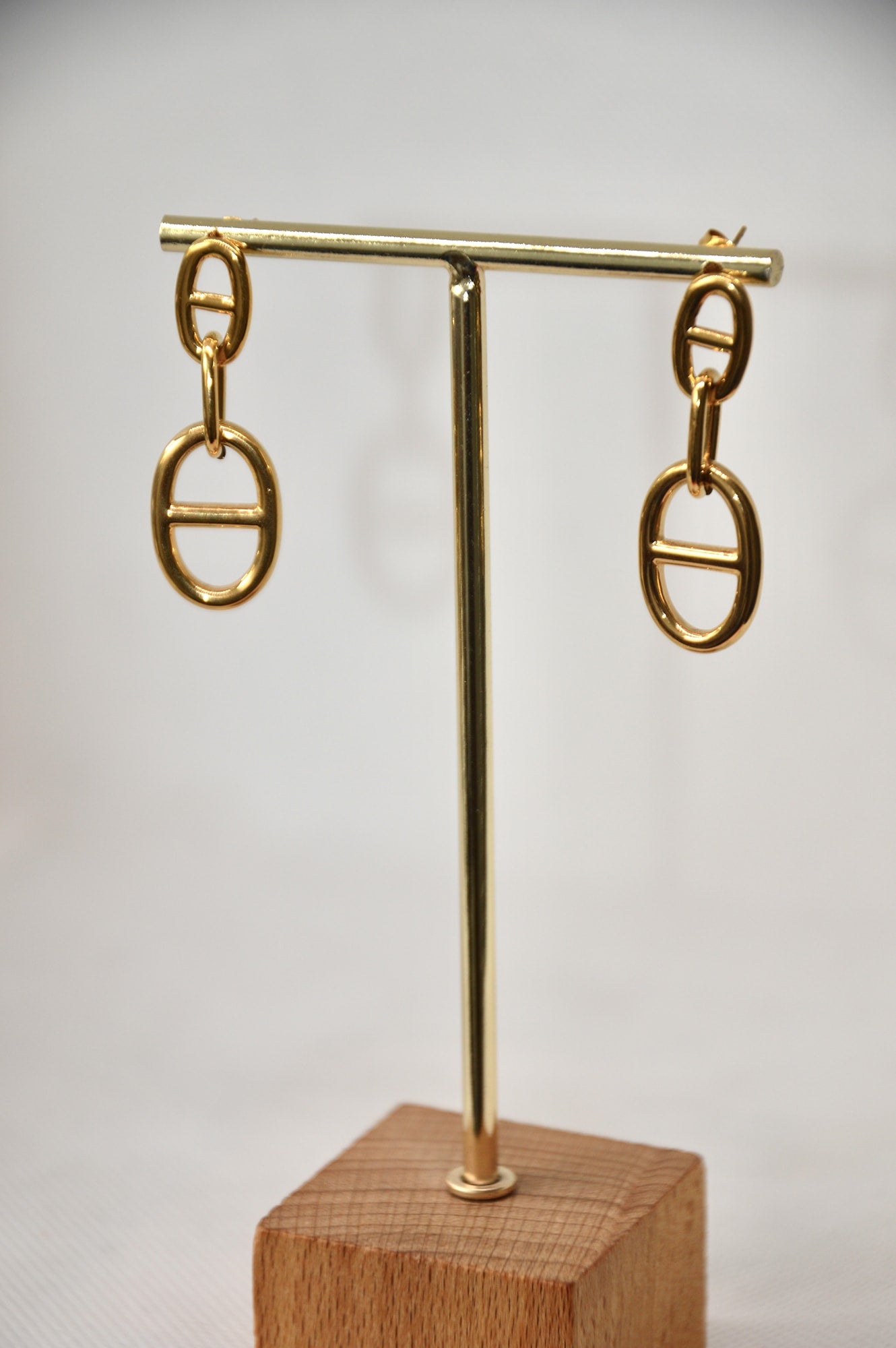 brincos longos dourados