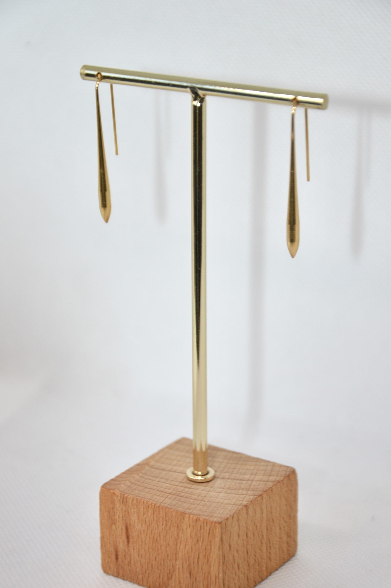 brincos longos finos