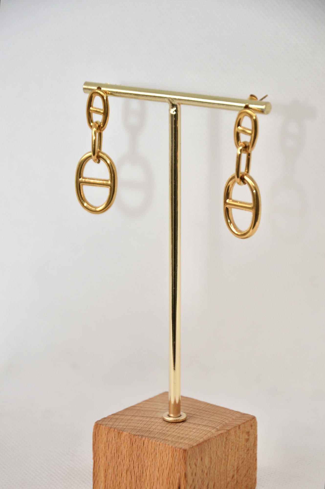 brincos longos dourados