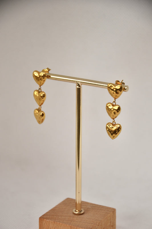 brincos tripple hearts